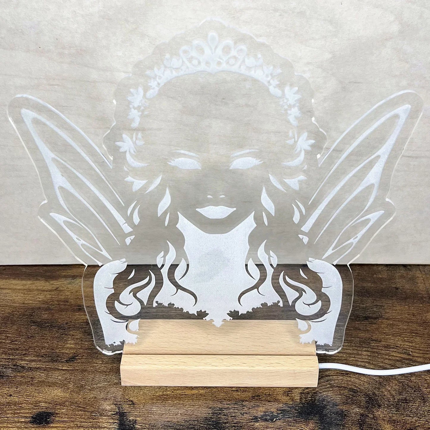 Fairy Queen LED Nightlight with acrylic design on wooden base.