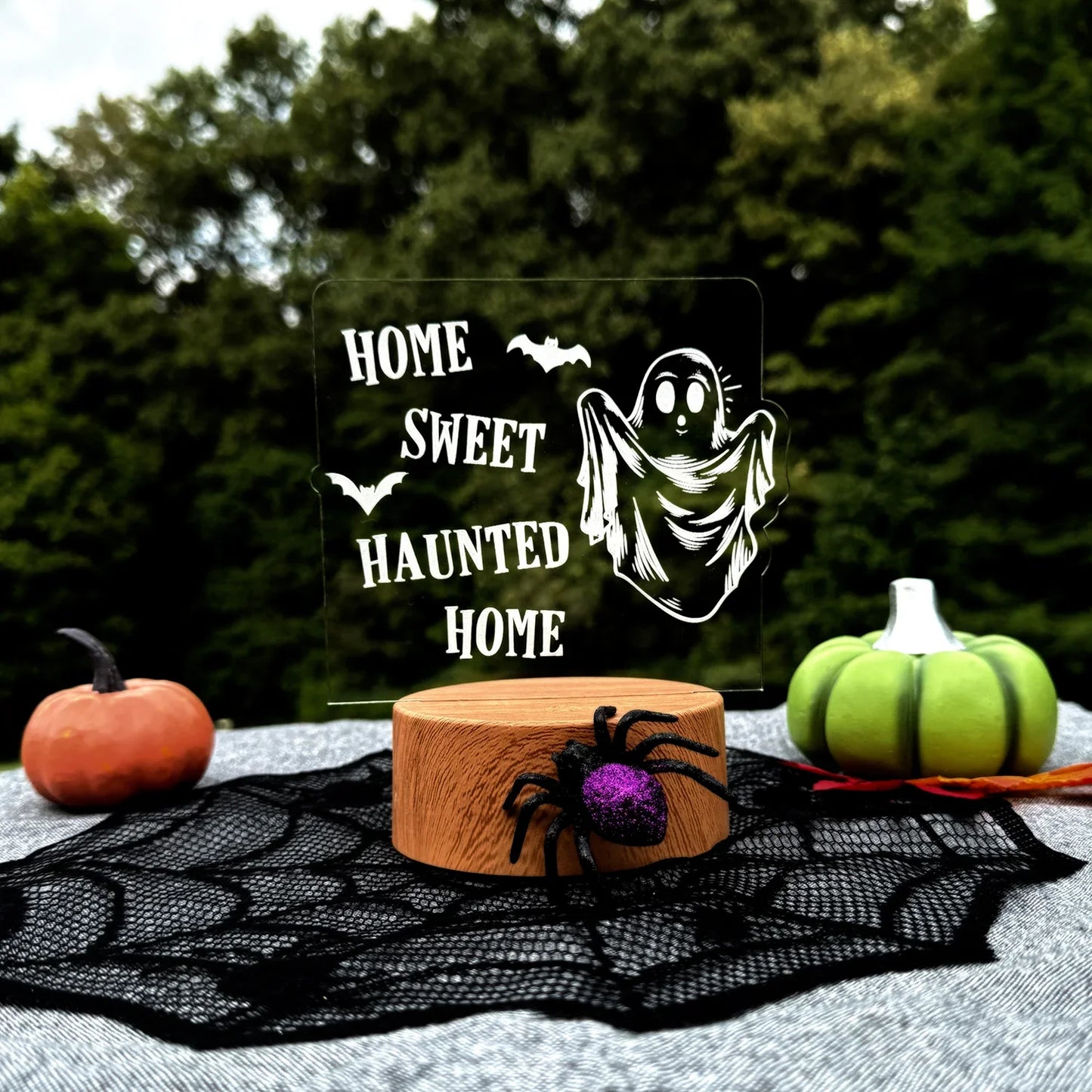 Home Sweet Haunted Home Halloween LED Nightlight with ghost design and pumpkins.