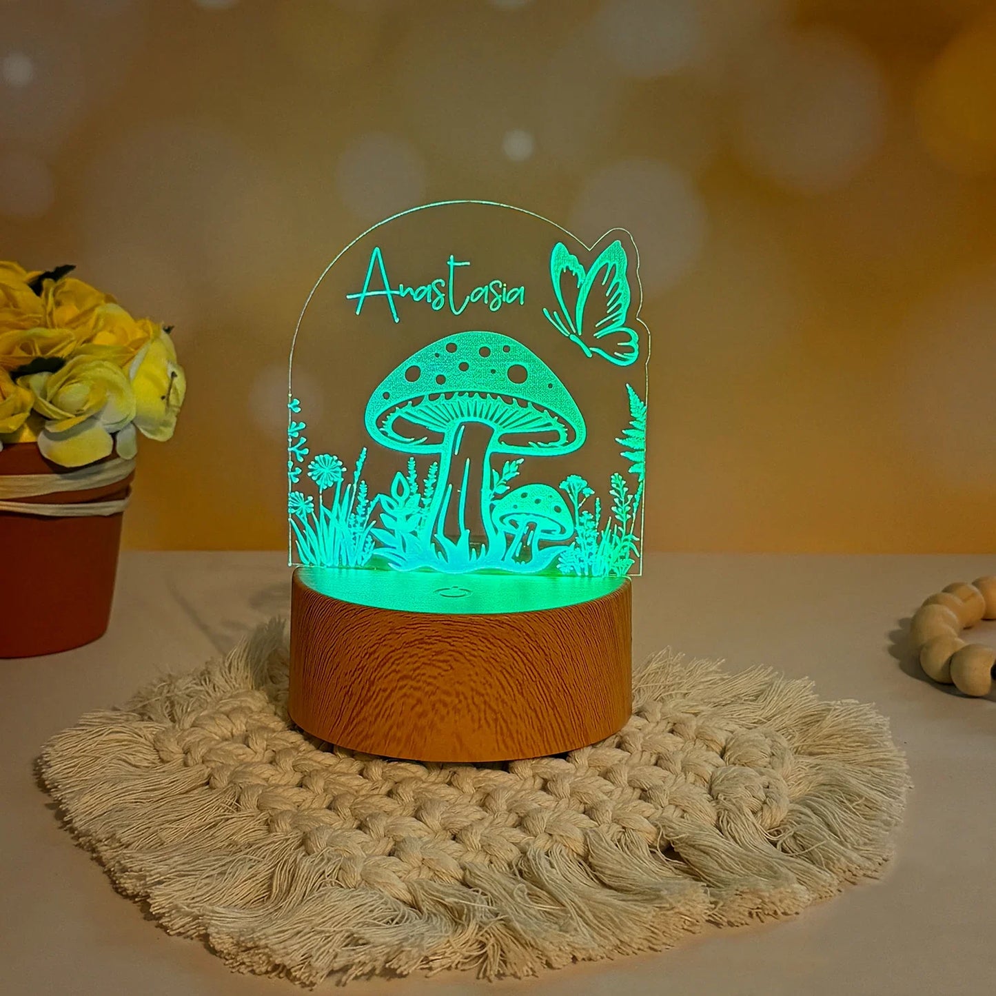 Personalizable forest mushroom with butterfly LED nightlight on wooden base.