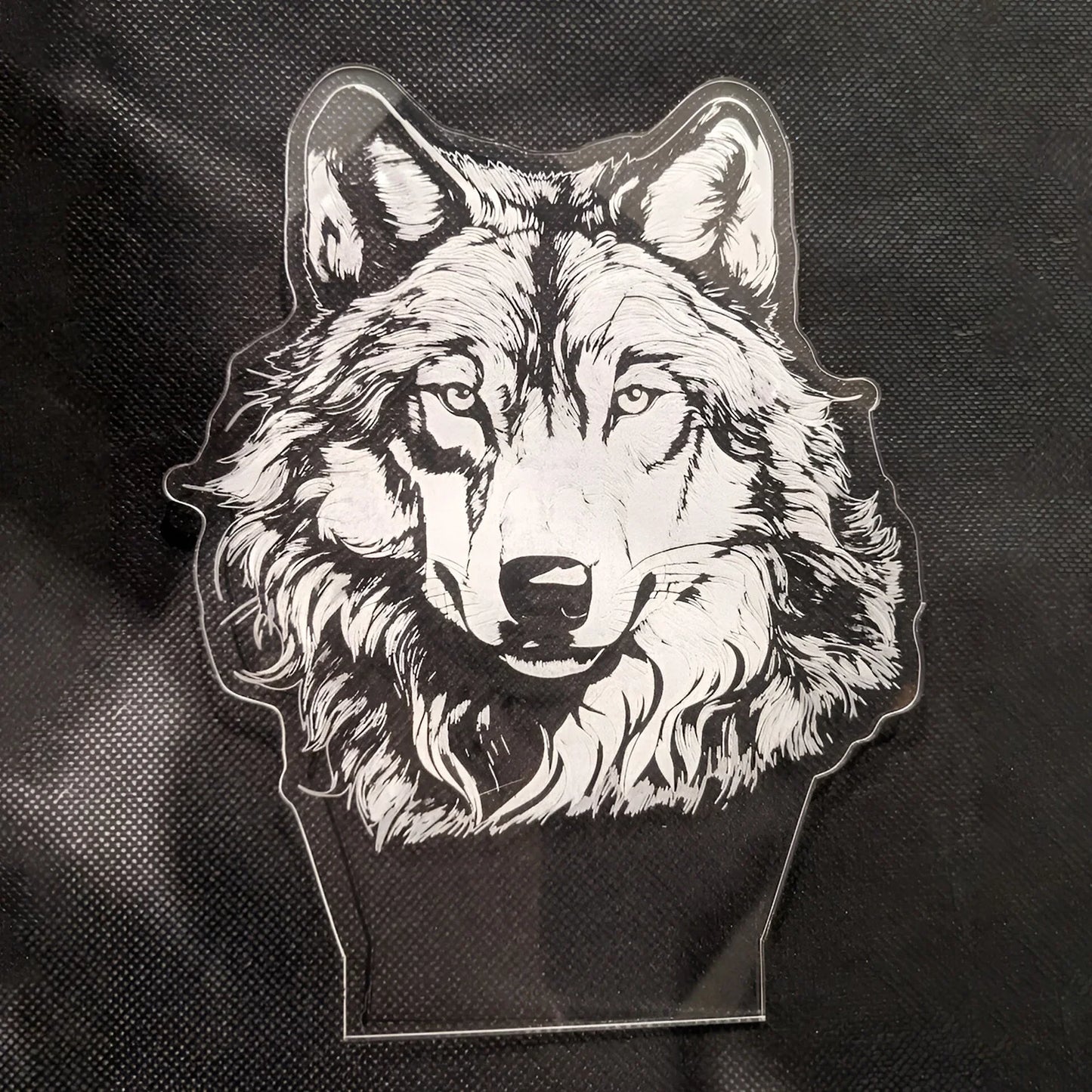 Lone Wolf LED Nightlight with laser-engraved acrylic wolf design.