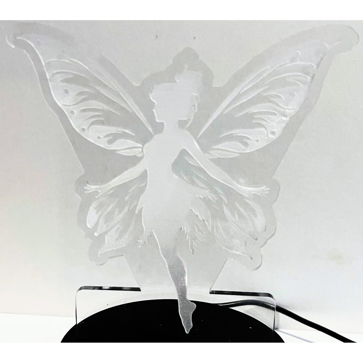 Fairy LED Nightlight #4 with illuminated wings on a stand.