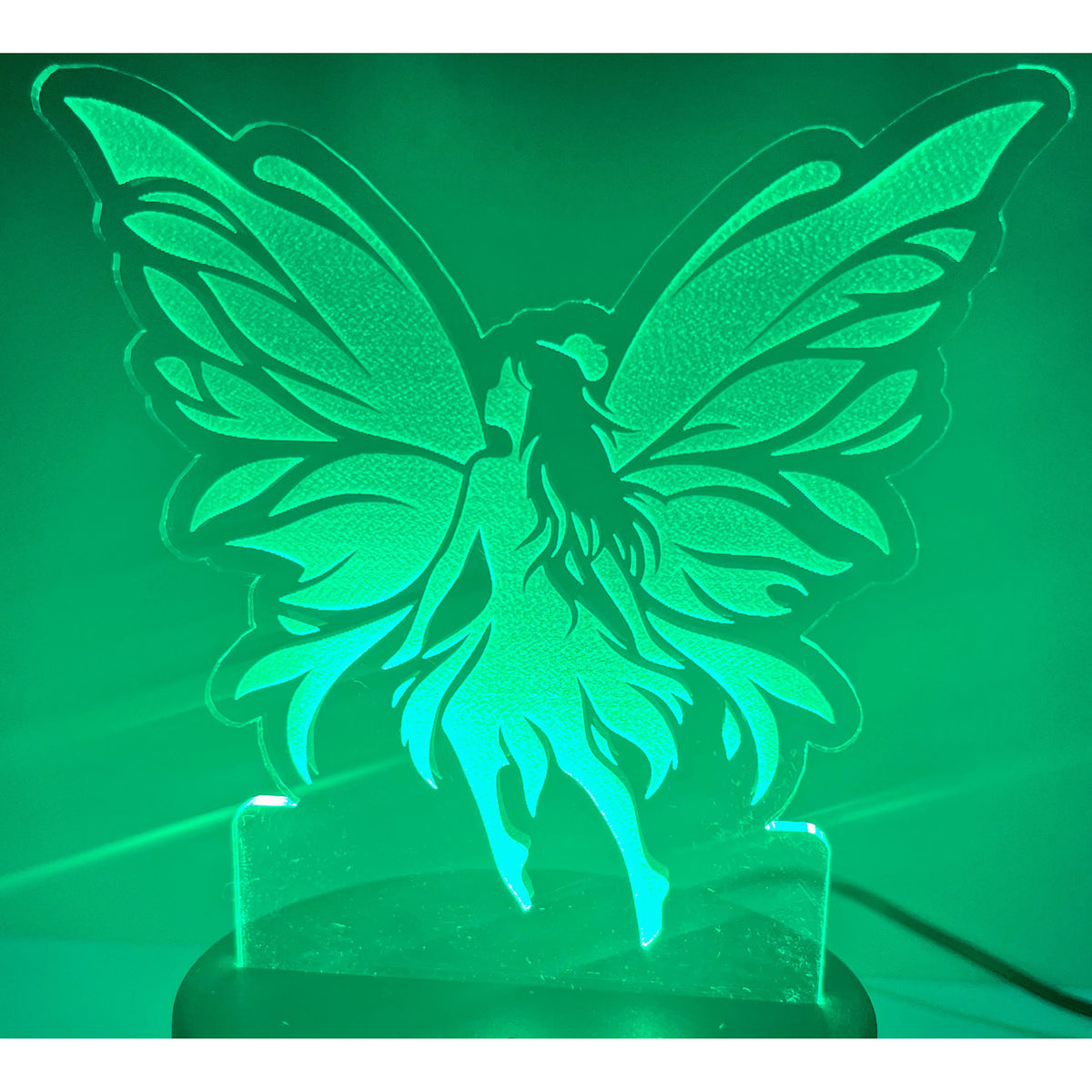 Fairy LED Nightlight with glowing green light and fairy design