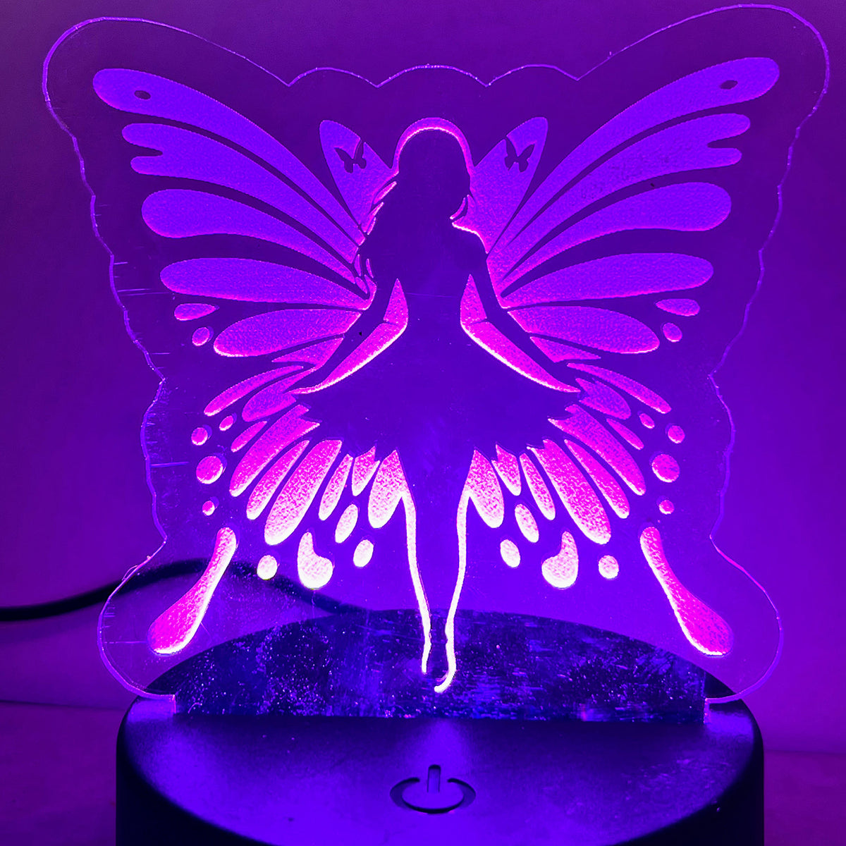 Fairy LED Nightlight # 1 with purple glow and fairy silhouette design.