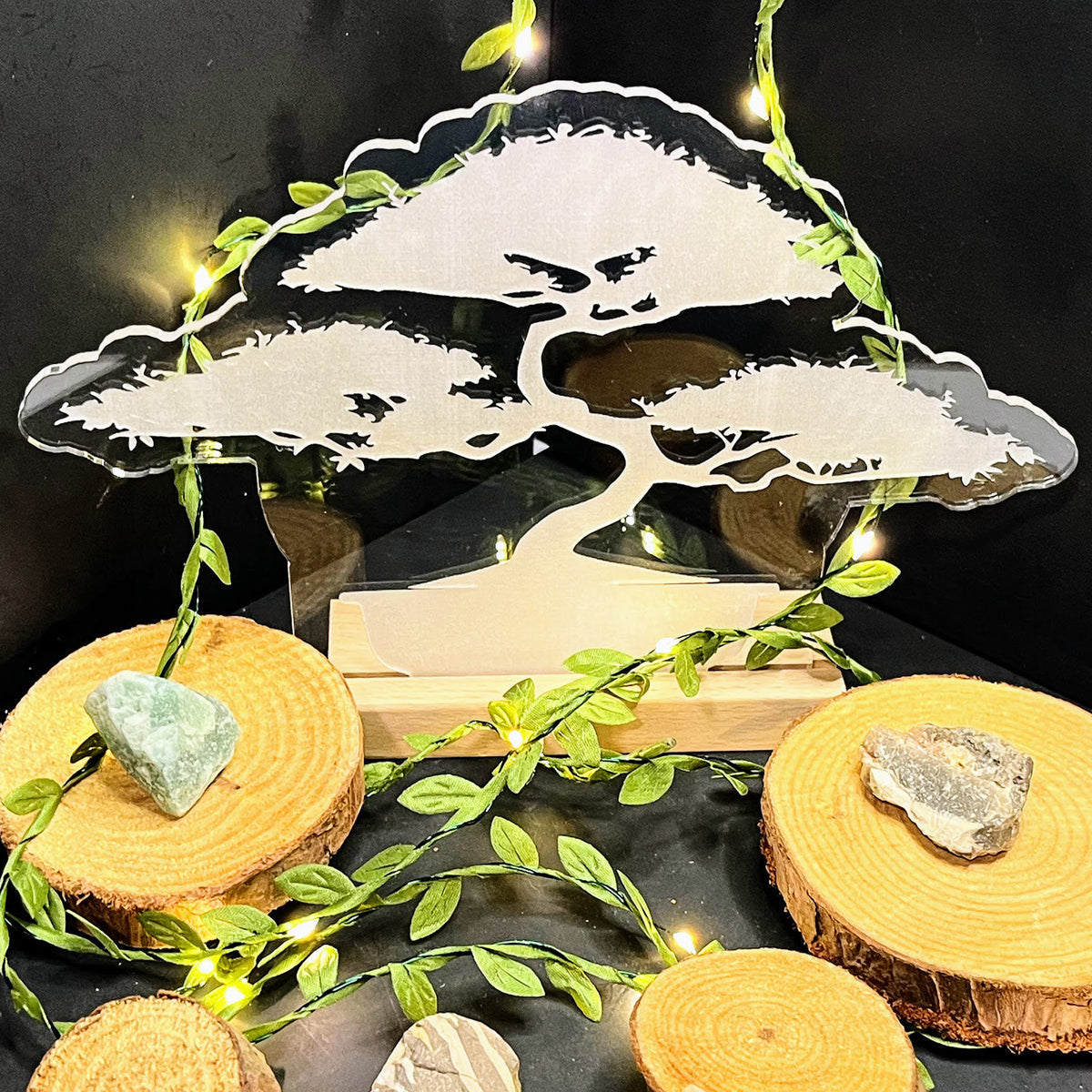 Large bonsai LED nightlight with illuminated tree design and decorative stones.