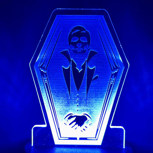 The Vampire's Rest LED Nightlight with glowing blue coffin design.